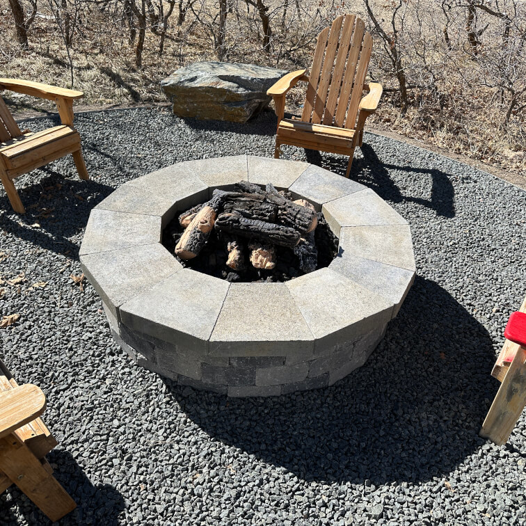 Custom made fire pit on gravel