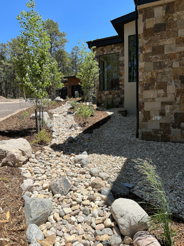 Natural landscaping Colorado river rock